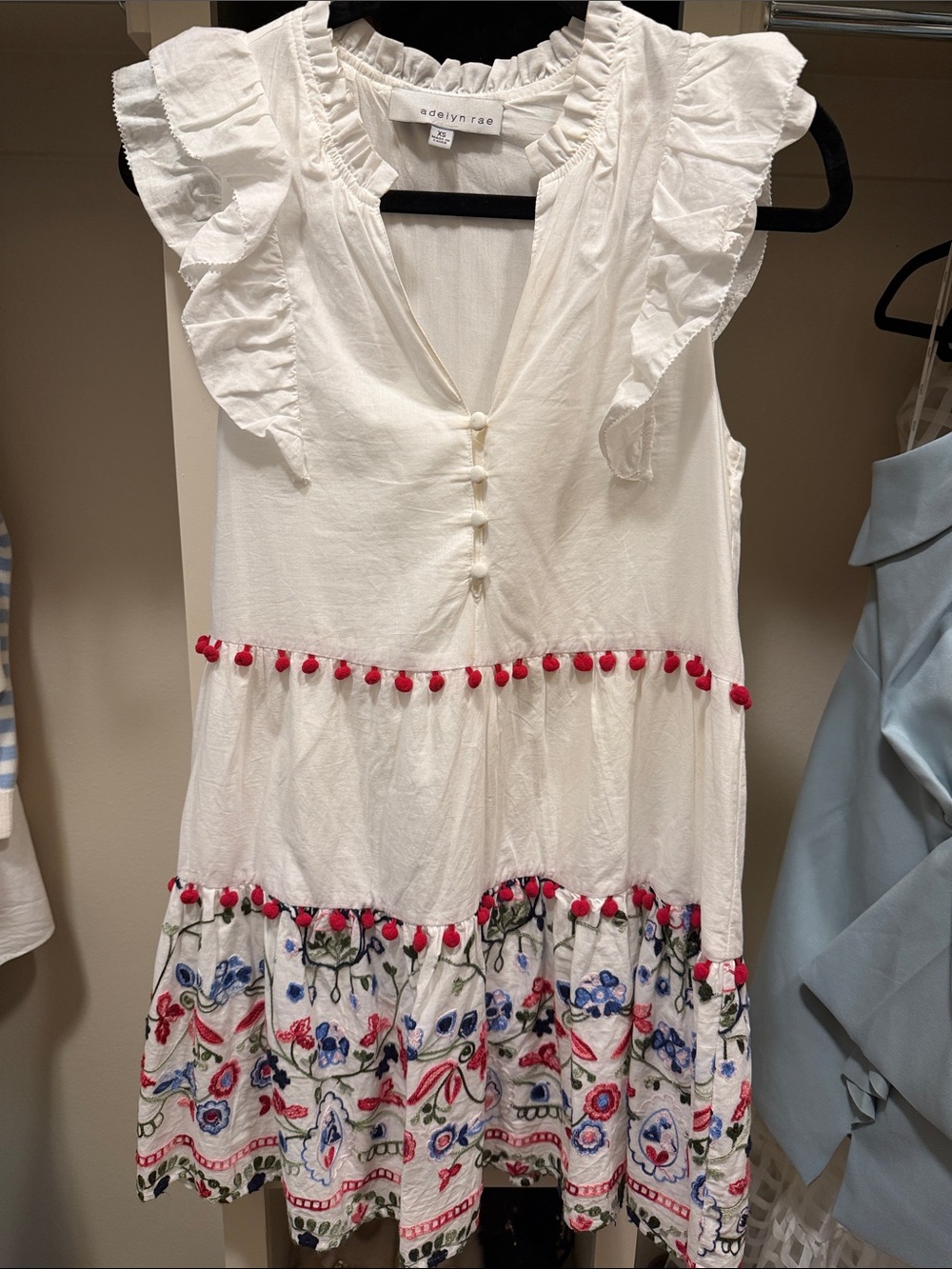 Adelyn Rae White Tunic with Red Pom Trim and Multicolor Floral Embroidery